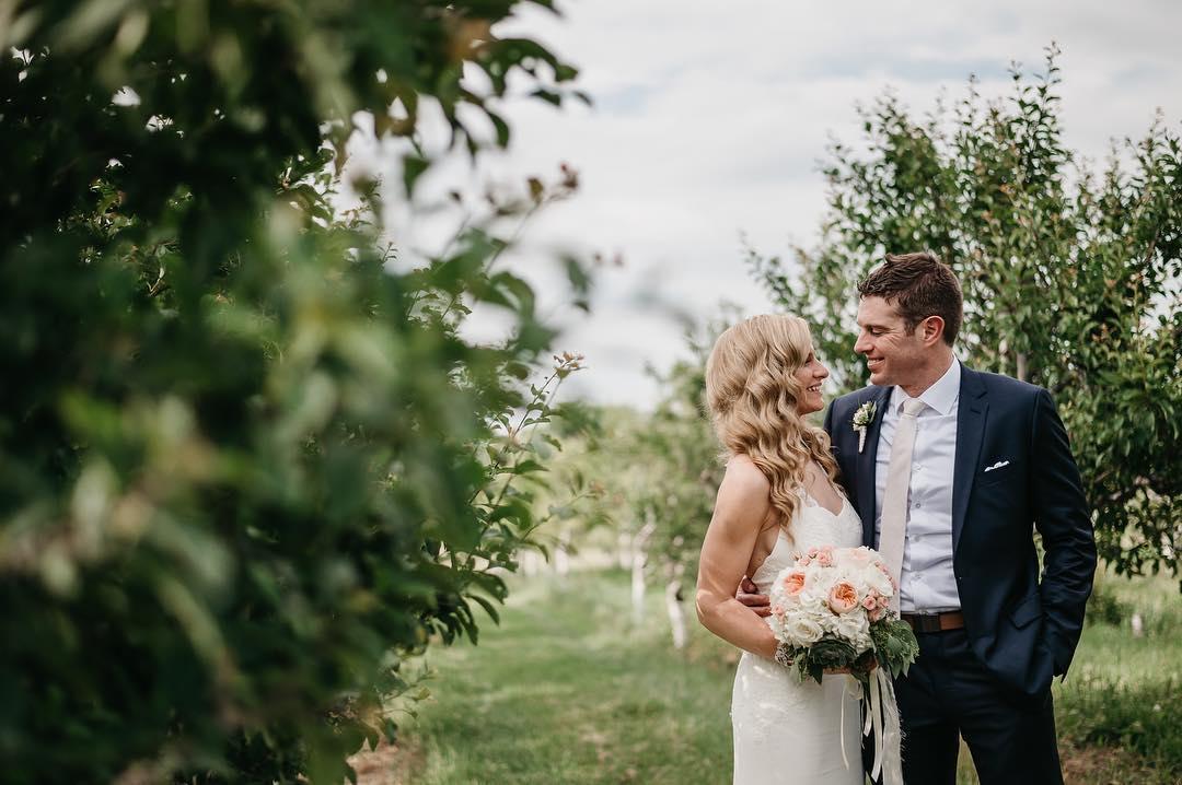 Wedding couple in an orchard