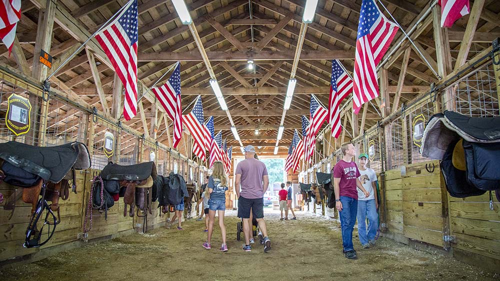 Youth fair barn with flags